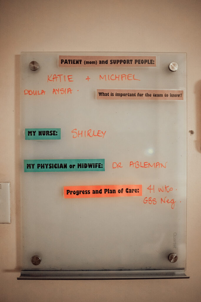 Information board displays the name of the patient, primary caregiver and supporting Doula. 